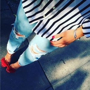 Banana republic women’s black and white stripe button down top.